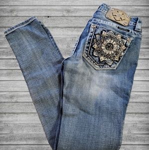 Mid rise light wash skinny jeans